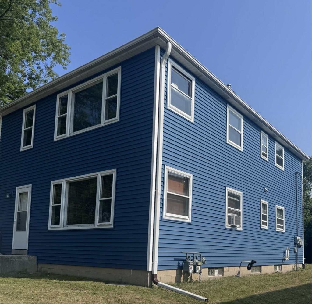 Libertyville IL blue vinyl siding installation by REXX Roofing